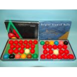 A boxed set of Belgian Aramith Tournament Champion Snooker Balls and a boxed set of Super Crystalate