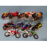 Eleven unboxed diecast and plastic motorcycle models, mainly unmarked, all on stands, (11).