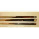 A collection of three snooker cues, comprising the Joe Davis "Club" cue 18oz, 58'', a Power Glide "