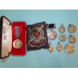A George V Naval Long Service Medal awarded to 281418 W C Francis Ch. Sto. HMS Woolwich, A Queen