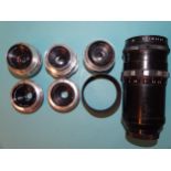 A Meyer-Optik Görlitz Primotar f3.5 135mm lens no.3208801 and five Staeble lenses: Teleon (x2),