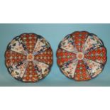 A pair of Oriental Imari-pattern chargers, 32cm diameter, (2).