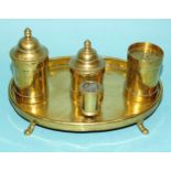 An unusual 18th century brass standish or desk set, the oval tray with removable pounce pot, fixed