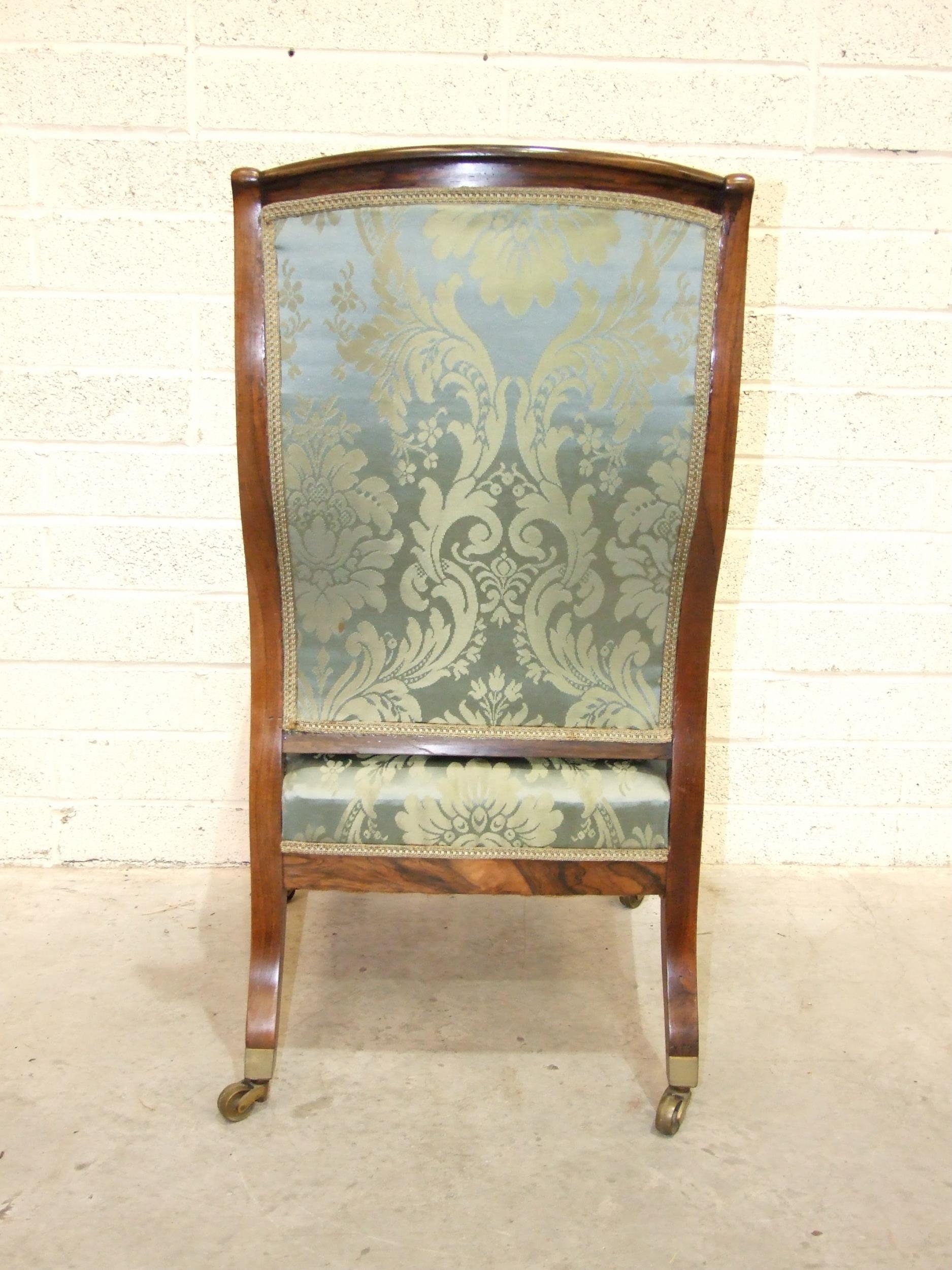An early-19th century rosewood library chair, the curved back with upholstered centre to partially- - Image 4 of 5
