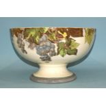 A large Royal Doulton punch bowl transfer-printed and painted with vines and grapes, green printed