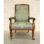 An early-19th century rosewood library chair, the curved back with upholstered centre to partially-