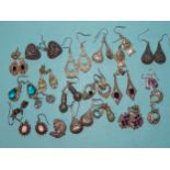 Twenty pairs of silver and white metal earrings, many gem-set, 139g.