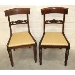 A set of ten reproduction mahogany dining chairs with drop-in seats, on tapered reeded front
