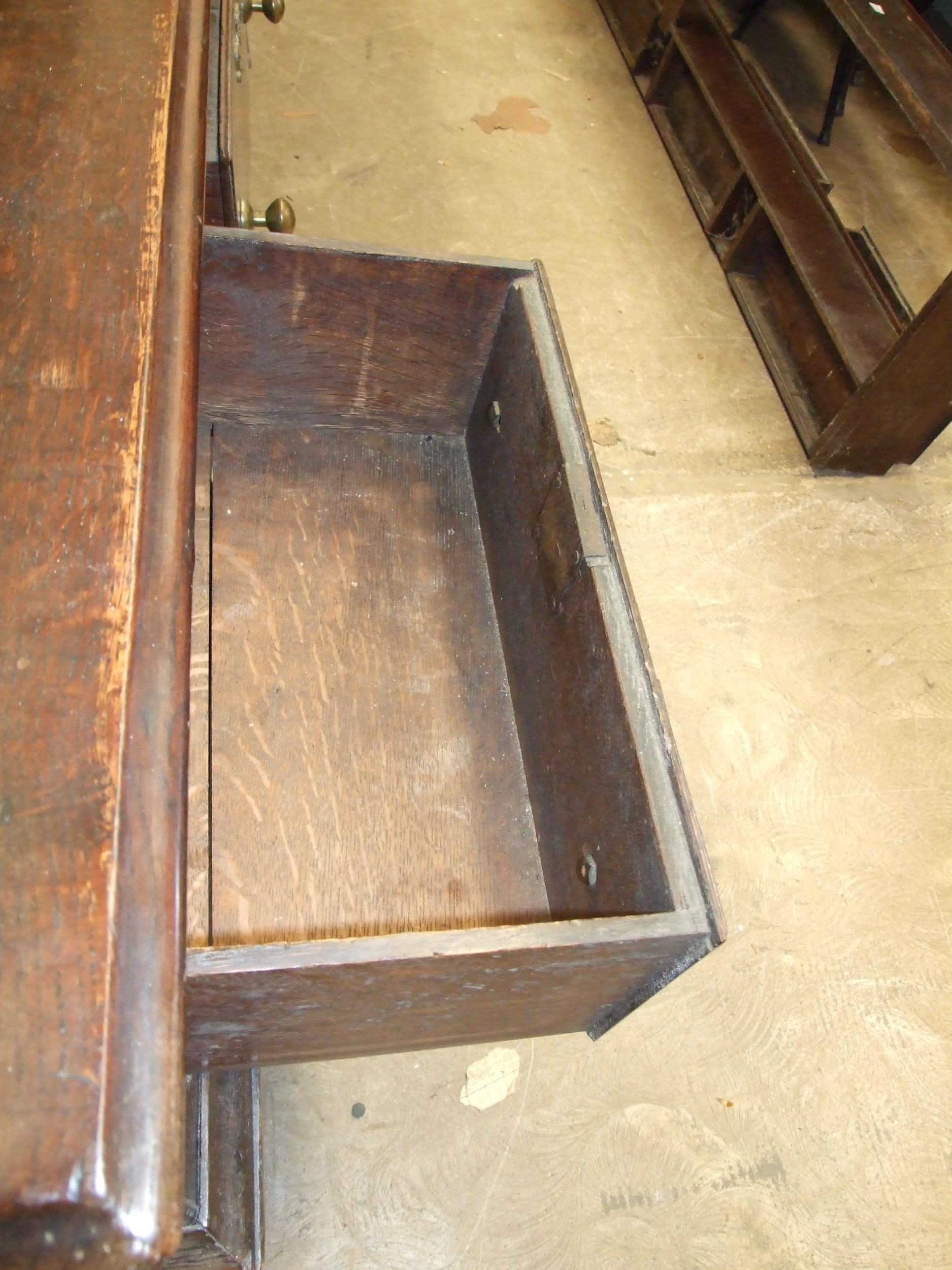 An 18th century oak dresser, the plate rack with cornice, shaped apron, three shelves and three - Image 2 of 6