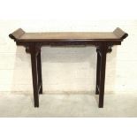 A Chinese hardwood rectangular altar table with carved frieze, on square legs, 123 x 40cm, 88cm