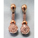 A pair of diamond earrings, each set a cluster of nine brilliant-cut diamonds below a link set