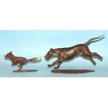 Sally Rutherford (b.1940), a cold-painted bronze figure of a fox and another of a hound, both on