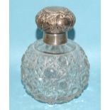 A late-Victorian hobnail-cut glass scent bottle with embossed silver hinged lid, London 1897, 13.5cm