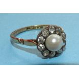 A Victorian pearl and diamond cluster ring set ten old brilliant-cut diamonds around a pearl, in