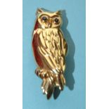 A modern 9ct gold brooch in the form of an owl with sapphire eyes, 43mm high, 7.6g.