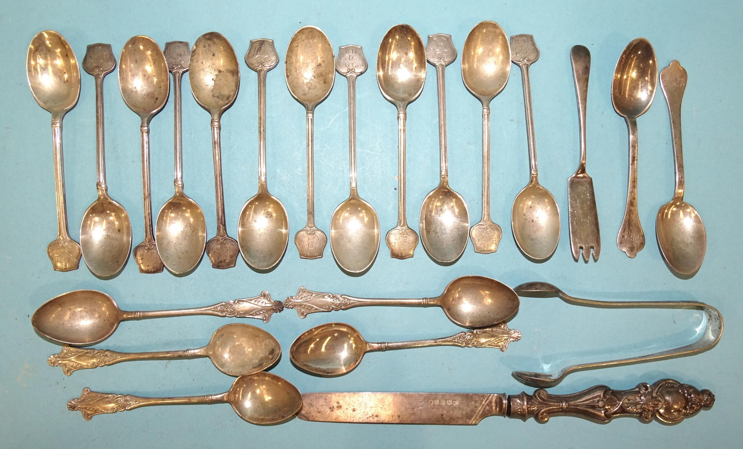 A set of twelve silver teaspoons, the shield terminals with engraved initials, Walker & Hall,