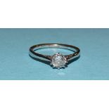 A solitaire diamond ring claw-set a brilliant-cut diamond of approximately 0.35cts, in 18ct white