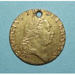 A George III 1787 gold guinea, (holed).