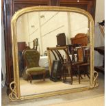 A large Victorian over-mantel mirror, the gilt frame with rope moulding tied in a knot at the
