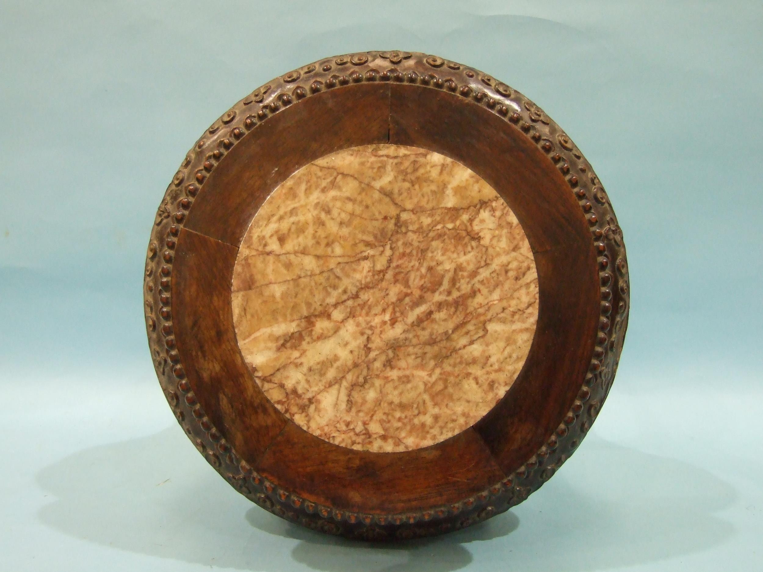 A Chinese carved hardwood plant stand with raised inset marble top, on five shaped and carved - Image 2 of 5