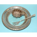 An American sterling silver shallow circular dish with pierced decoration and glass base, stamped