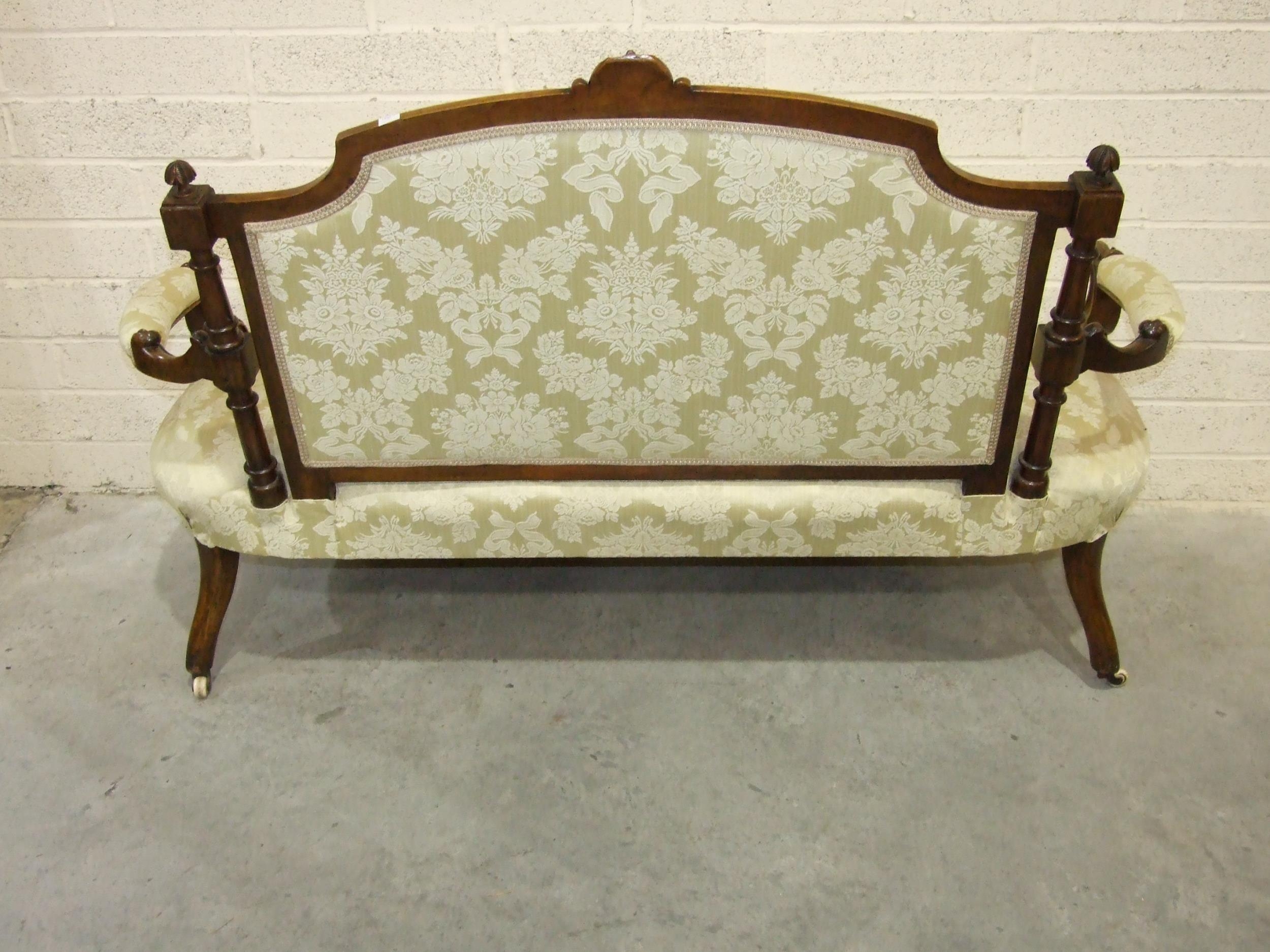 A late-Victorian walnut drawing room settee, the carved and upholstered back to scroll open arms and - Image 3 of 3