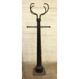 A Victorian cast iron short lamp post with fittings for a copper lamp, 154cm high.