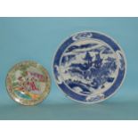 A late-19th century large Chinese charger decorated with blue and white pagoda, figures and scenery,