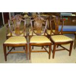 A set of six reproduction Hepplewhite-style dining chairs, includes two carvers, (6).