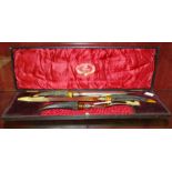 A three-piece horn-handled 'The Majestic' carving set by Thomas Turner & Co, in fitted case.