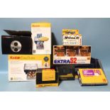 A Kodak Easy Share V570 dual-lens digital camera, PD3 printer dock, paper, etc. and other Kodak