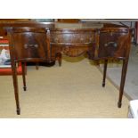 A Georgian-style small serpentine sideboard fitted with three drawers, 107cm wide, a Georgian fold-