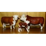 A Beswick Hereford bull 'Champion of Champions', a similar Hereford cow 'Champion of Champions'