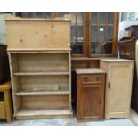 A set of pine open freestanding shelves, 94cm wide, 109cm high, a modern pine blanket chest, a small