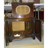 A Pamphonic valve radio in walnut two-door case, 50.5cm wide, 43cm high and a Ferranti valve