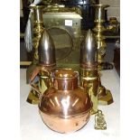 A pair of 19th century brass candlesticks, 29cm high, two brass military shells, 24cm high, a