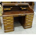 Indianapolis Cabinet Co, a roll-top desk, the 'S'-shaped shutter front opening to reveal two drawers