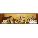 A collection of ten Goebel bird sculptures, (Pheasant a/f), a Goebel 'Drummer Boy', a Beswick