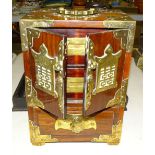 An Oriental brass-bound hardwood table-top cabinet fitted with three drawers, 17cm wide, 23cm