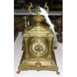 A French brass case striking mantel clock with embossed decoration, the movement marked A D