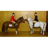 A Beswick Huntsman on brown gloss horse and a Beswick Huntswoman on grey gloss horse, both 21.5cm