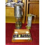 A Patterson Lamps Ltd type HCP miner's safety lamp with corrugated upper section, stamped 213,