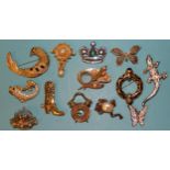 Twelve costume jewellery brooches by Grosse, S.A.L. and others including an alien space ship,