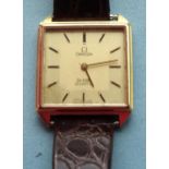 Omega De Ville, a lady's square face gold-plated wrist watch with quartz movement (untested),