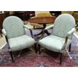 A pair of early 20th century upholstered seat and back chairs, the partially-padded and reeded