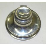 A small silver capstan inkwell, 5cm high, base 9.5cm diameter, with hinged lid with initials Chester