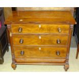 A late 19th century stained mahogany chest of three long cockbeaded drawers and a base drawer on