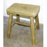 W. Burch, Wycombe 1914, an elm and beech stool with turned legs, stamped to base, 39cm x 25.5cm,