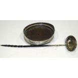 A George III silver punch ladle with baleen twist handle, London 1819, and an oval pierced silver