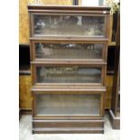 A Globe Wernicke four-tier oak bookcase, three sections fitted with lockable glazed doors, 87cm